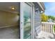 Balcony view featuring a glimpse into the adjacent bedroom with natural light at 8056 Meadowdale Sq, Niwot, CO 80503