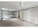 Finished basement featuring carpet, paneled walls, recessed lights, and closet at 8056 Meadowdale Sq, Niwot, CO 80503