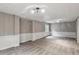 Finished basement featuring carpet, paneled walls, and recessed lighting at 8056 Meadowdale Sq, Niwot, CO 80503