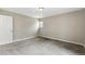 Neutral bedroom offers ample space, carpeting, and lots of natural light at 8056 Meadowdale Sq, Niwot, CO 80503