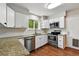 Modern kitchen featuring stainless steel appliances, granite countertops, and ample storage at 8056 Meadowdale Sq, Niwot, CO 80503
