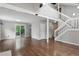 Spacious living room featuring beautiful hardwood floors and natural light at 8056 Meadowdale Sq, Niwot, CO 80503