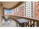 Balcony featuring a view and chairs at 1950 N Logan St # 601, Denver, CO 80203