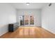 Bright bedroom with sliding doors to a private balcony and lots of natural light at 1950 N Logan St # 601, Denver, CO 80203