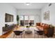 Modern living room features stylish decor, comfortable seating, and a bright airy ambiance at 1950 N Logan St # 601, Denver, CO 80203