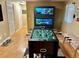Entertaining basement with a foosball table, a fish tank, and extra seating at 4303 S Yank St, Morrison, CO 80465