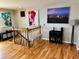 Elegant foyer with hardwood floors and a view of the stairs at 4303 S Yank St, Morrison, CO 80465