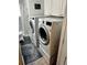 Convenient laundry area with white, modern washer and dryer at 4303 S Yank St, Morrison, CO 80465