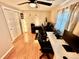 Bright home office with wood flooring, ceiling fan, great lighting, and ample storage at 4303 S Yank St, Morrison, CO 80465