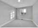 Bright bedroom with carpeted floor and a window offering natural light at 4663 S Buckley Way, Aurora, CO 80015