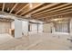 Spacious unfinished basement with high ceilings and potential for customization at 5193 Rustic Ave, Firestone, CO 80504