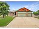 Charming two-story home featuring a three-car garage and a well-manicured lawn at 5193 Rustic Ave, Firestone, CO 80504