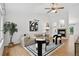 Bright living room with stylish furniture and a cozy fireplace feature at 5193 Rustic Ave, Firestone, CO 80504