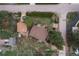 Aerial view showcasing homes with mature trees, lush yards, and neighborhood streets at 25 High St, Palmer Lake, CO 80133