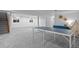 Spacious finished basement with plush carpeting, multiple windows, and recreational areas, ideal for entertainment at 25 High St, Palmer Lake, CO 80133
