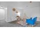 Finished basement play area featuring a teepee, small storage shelves, and woven wall art at 25 High St, Palmer Lake, CO 80133
