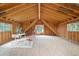 Spacious bonus room with natural wood walls, large windows, and seating for gathering at 25 High St, Palmer Lake, CO 80133