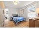 Cozy bedroom with light-colored walls and simple furnishings at 400 S Gilpin St, Denver, CO 80209