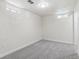 Finished basement area with carpeted flooring and windows providing natural light at 1155 W 4Th Ave, Broomfield, CO 80020