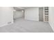 Large finished basement with neutral paint, carpeting, and recessed lighting at 1155 W 4Th Ave, Broomfield, CO 80020