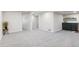 Finished basement with plush carpeting, neutral walls, and a bar area with seating at 1155 W 4Th Ave, Broomfield, CO 80020