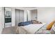 Inviting bedroom with cozy bed and a bathroom view, offering a relaxing and private retreat at 1155 W 4Th Ave, Broomfield, CO 80020