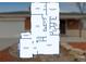 A detailed floor plan of a home showcasing the layout of the kitchen, living room, and bedrooms at 1155 W 4Th Ave, Broomfield, CO 80020