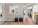 Open hallway design with decorative wallpaper, and seamless flow into other living areas at 1155 W 4Th Ave, Broomfield, CO 80020