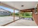 Covered patio with concrete flooring and wood support beams at 1155 W 4Th Ave, Broomfield, CO 80020
