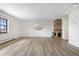Spacious living room with a cozy brick fireplace and lots of natural light at 1021 Carr St # 37, Lakewood, CO 80214