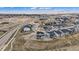 An aerial view that shows the location of the home within a neighborhood featuring mountain views and spacious lots at 555 Coal Bank Trl, Castle Rock, CO 80104