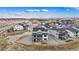 Stunning aerial view of a modern, two-story home with a fenced yard in a vibrant neighborhood and beautiful landscaping at 555 Coal Bank Trl, Castle Rock, CO 80104