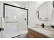 Bathroom featuring a vanity with granite countertop, modern fixtures and a walk-in shower at 555 Coal Bank Trl, Castle Rock, CO 80104