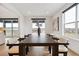 Dining room with sleek table and chairs, bright natural light, and an amazing view at 555 Coal Bank Trl, Castle Rock, CO 80104