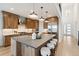 Gourmet kitchen features a large center island, stainless steel appliances, and modern finishes at 555 Coal Bank Trl, Castle Rock, CO 80104
