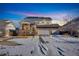 Charming two-story home with a three-car garage and a well-manicured lawn, providing great curb appeal at 226 N Millbrook St, Aurora, CO 80018
