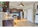 Well-equipped kitchen featuring stainless steel appliances and dark wood cabinets at 226 N Millbrook St, Aurora, CO 80018