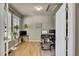 Bright home office featuring hardwood floors, natural light, and modern desk setups at 226 N Millbrook St, Aurora, CO 80018