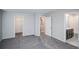 Spacious bedroom featuring an en suite bathroom and walk-in closet at 17600 Rose Heath Ln, Parker, CO 80134