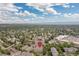 Expansive aerial view of a townhome community nestled among mature trees and green spaces in a vibrant neighborhood at 5555 E Briarwood Ave # 1404, Centennial, CO 80122