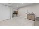 Spacious finished basement featuring neutral carpet and closet storage at 5555 E Briarwood Ave # 1404, Centennial, CO 80122