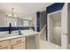 Bright kitchen area with stainless steel dishwasher, sink, and staircase at 5555 E Briarwood Ave # 1404, Centennial, CO 80122