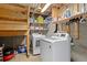 Laundry room features new washer and dryer at 5555 E Briarwood Ave # 1404, Centennial, CO 80122
