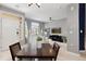 Cozy living room and dining area with natural light and neutral color palette at 5555 E Briarwood Ave # 1404, Centennial, CO 80122