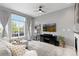 Comfortable living room featuring a large window and modern decor at 5555 E Briarwood Ave # 1404, Centennial, CO 80122