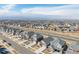 An aerial view highlights the neighborhood's layout, streetscape, and overall community design at 1079 Larkspur Dr, Erie, CO 80516