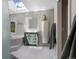 Bright bathroom with tub, shower, vanity, and storage at 15207 W Ellsworth Pl, Golden, CO 80401