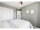 Relaxing bedroom with neutral tones and a sliding closet door at 15948 E 106Th Pl, Commerce City, CO 80022