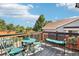Outdoor deck providing a space to unwind and beautiful landscaping at 15948 E 106Th Pl, Commerce City, CO 80022