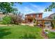 Beautiful backyard featuring a lawn, patio and hot tub at 21502 E Idyllwilde Dr, Parker, CO 80138